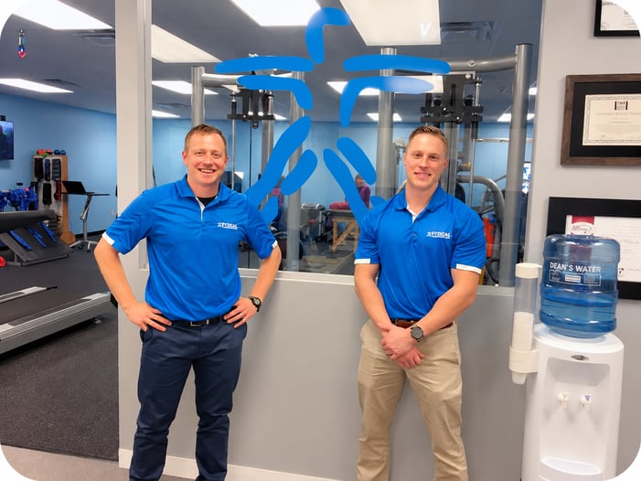 FYZICAL owners Todd Exley, MPT (left), and Phil Firkins, DPT (right), in the FYZICAL facility