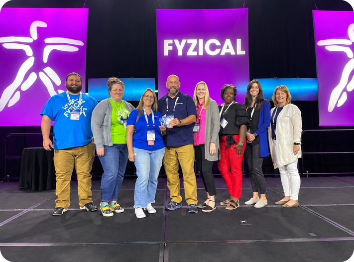 2023 FYZICAL Franchisee of the Year Jerry Yarborough, PT, DPT Master Franchisee and his team at FYZICAL Therapy & Balance Center's Brand Triumph.