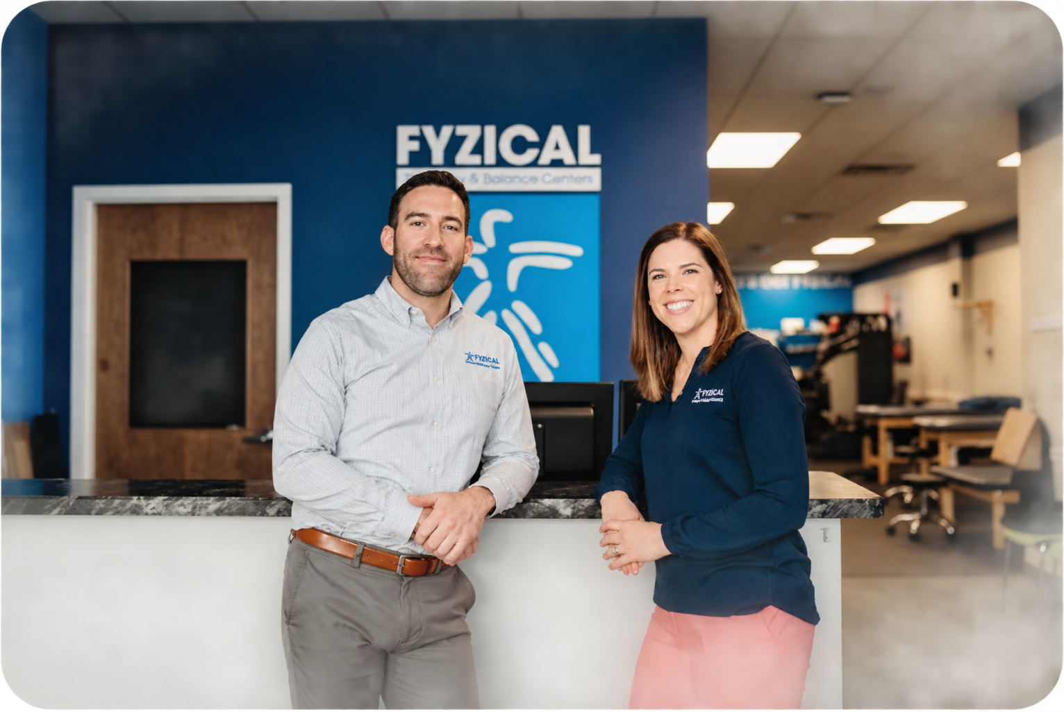 FYZICAL's entrepreneur Karla Mazza and physical therapist Christ Bailey standing inside a FYZICAL Therapy & Balance Centers clinic.