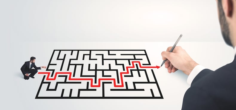 Business man looking at hand drawing solution, maze solution concept