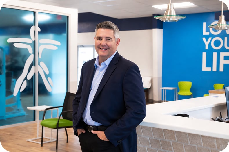 A picture of Brian Belmont, CEO of FYZICAL, in the FYZ facility 