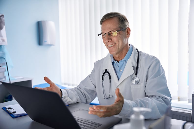 a doctor talking on a zoom call