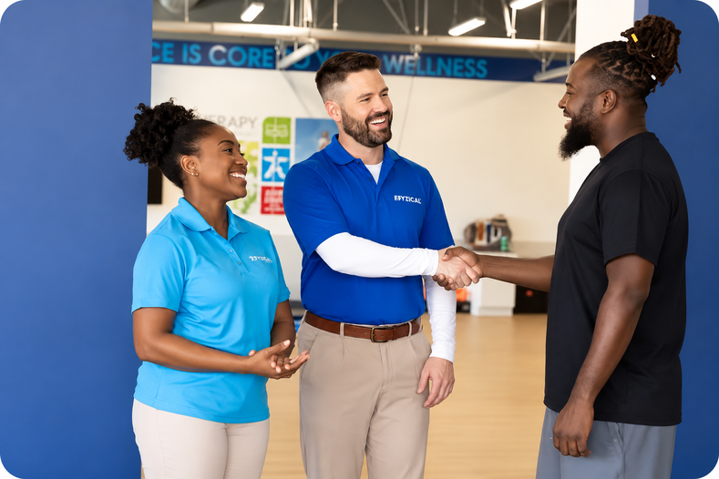 FYZICAL team members welcoming a patient inside a FYZICAL Therapy & Balance Centers clinic.